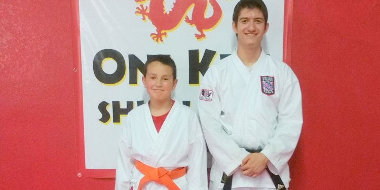 Karate student receives orange