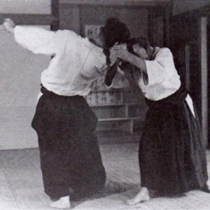 Morihei Ueshiba executing a