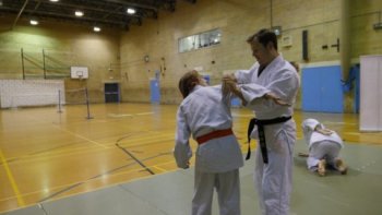 Sensei Ondrej demonstrating an aikido technique during class